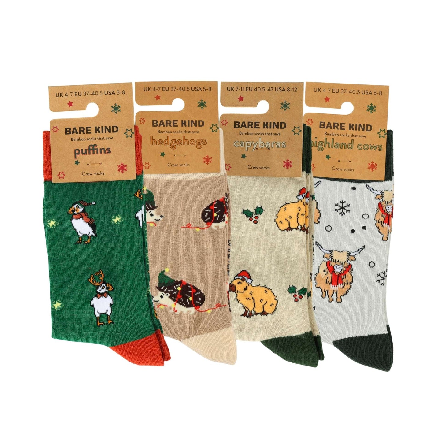 Four pairs of socks with animal designs in their packaging, featuring 'Bare Kind' branding.