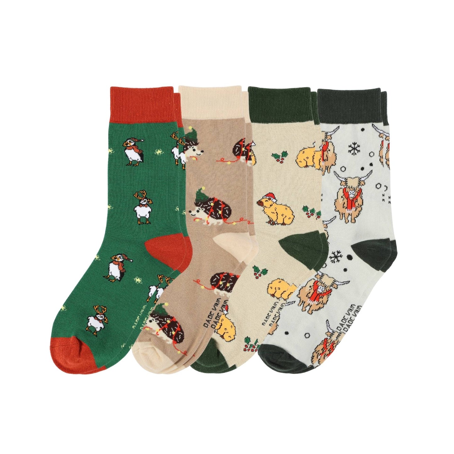 Four pairs of socks with animal patterns on a white background