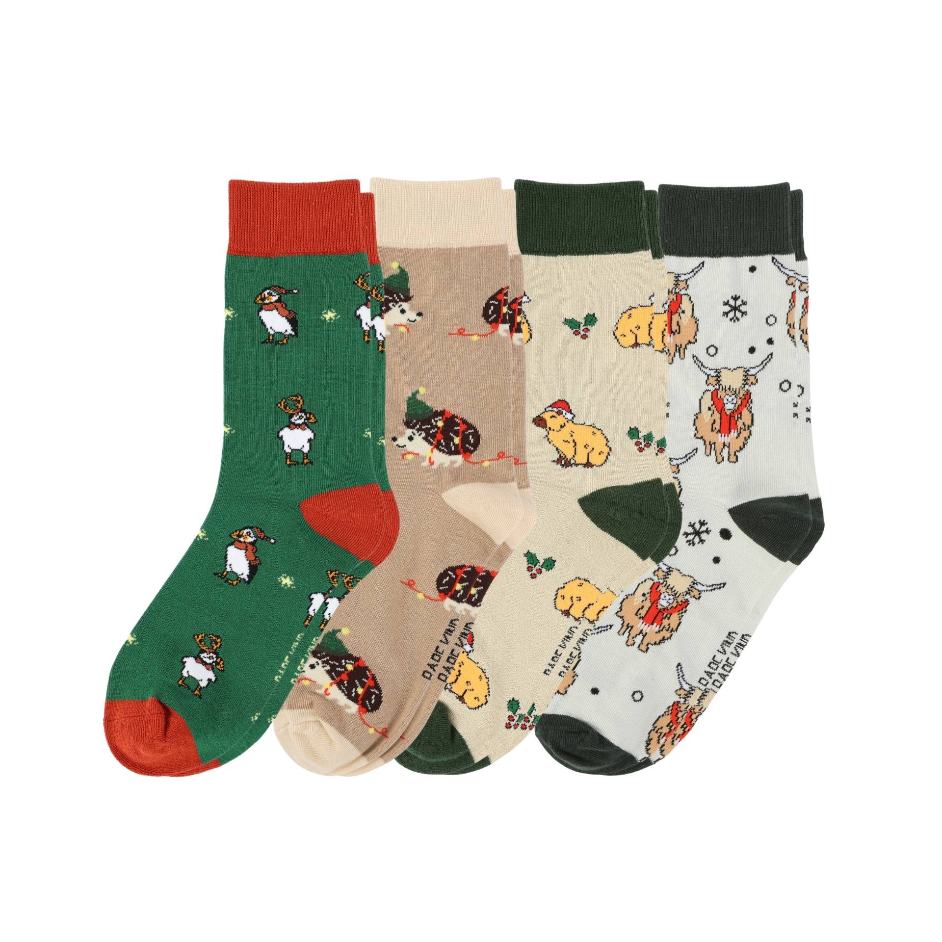 Four pairs of socks with animal patterns on a white background