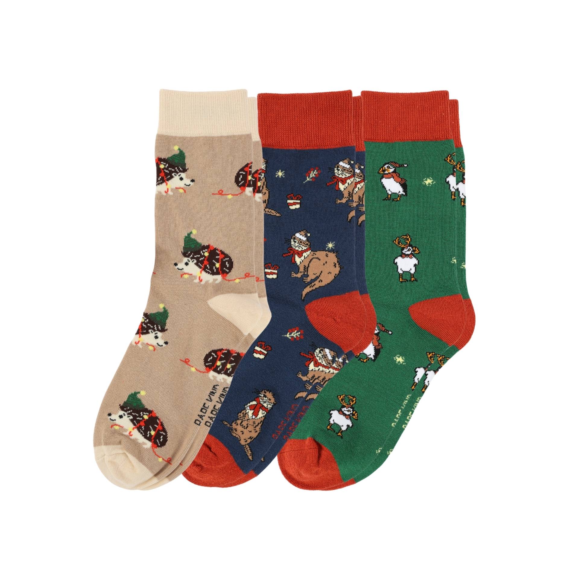 Three pairs of socks with animal patterns on a white background