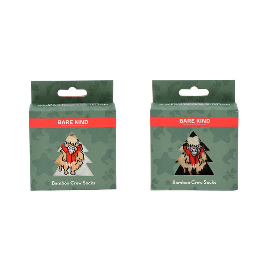 Two packages of Bare Kind Bamboo Crew Socks shown side by side on a plain white background. The packaging is dark green with a camouflage pattern, a red band with white text, and an illustration of a cartoon character wearing the socks.