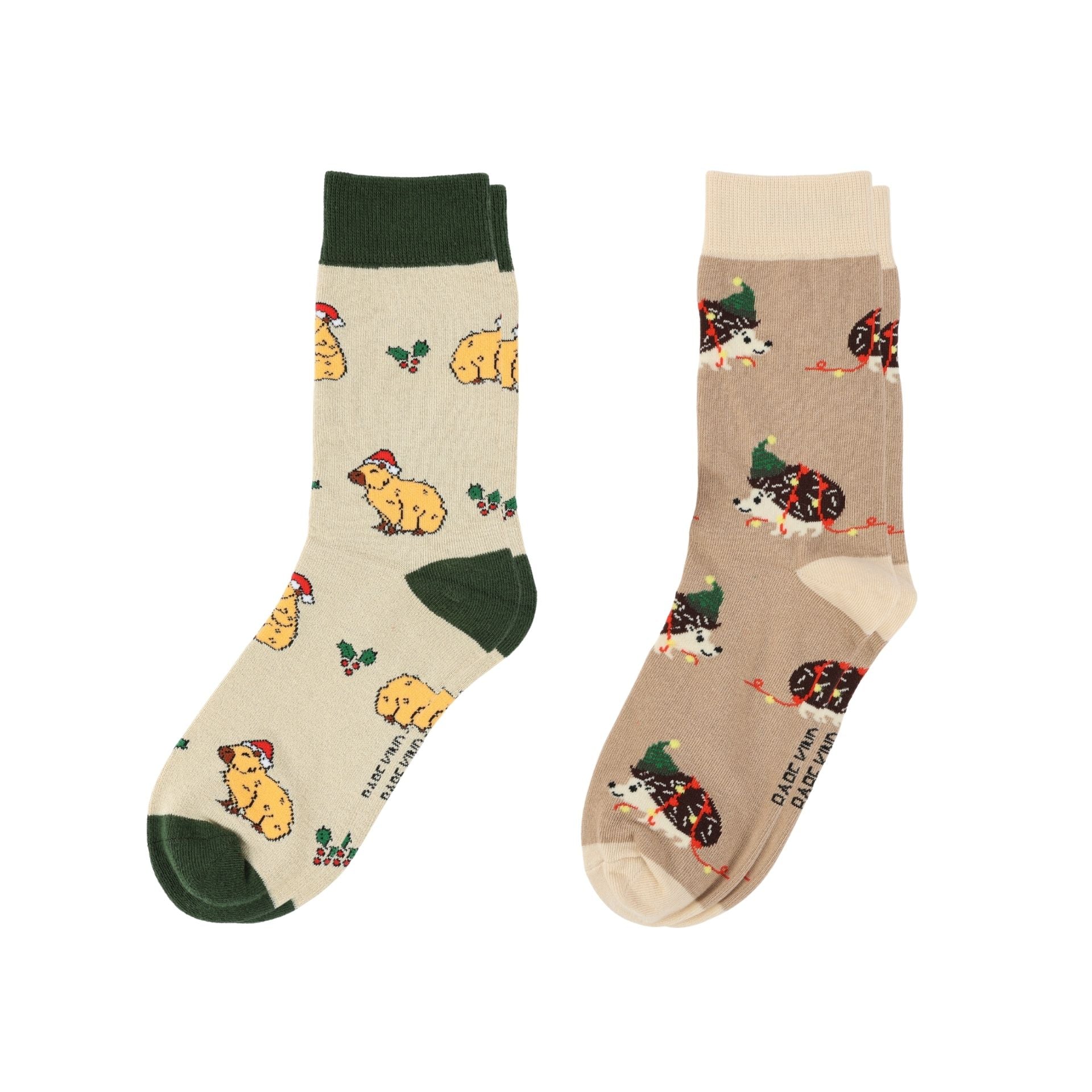 Two pairs of socks with animal patterns on a white background