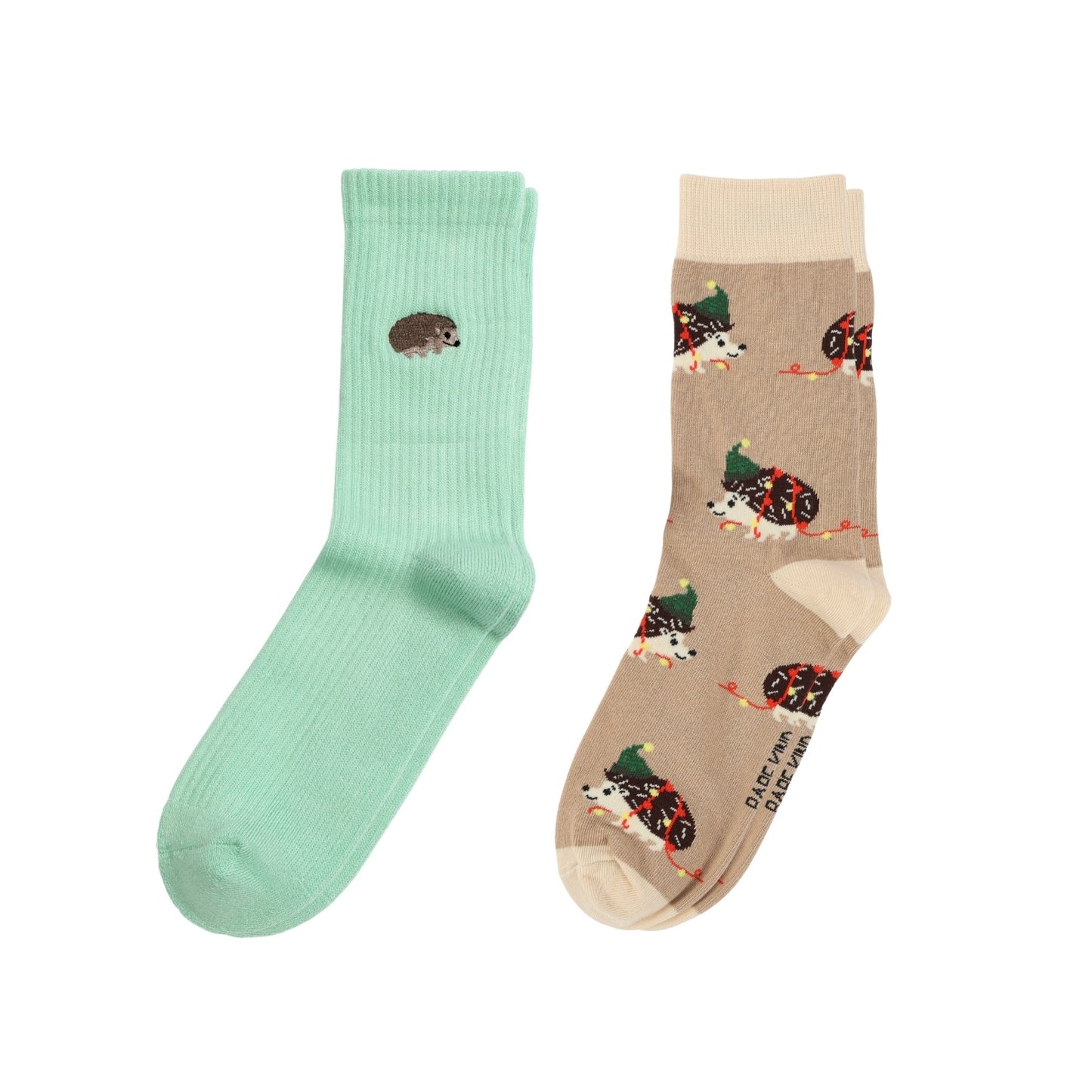 Two crew socks shown flat on a white background: one mint green sock with a small hedgehog graphic, and one tan sock with a repeating hedgehogprint and cream cuffs/toes.
