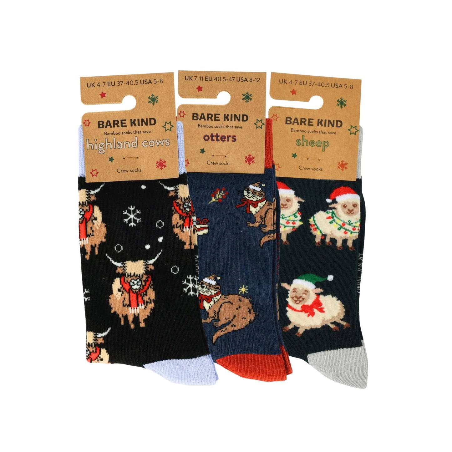 Three pairs of Christmas-themed socks with animal illustrations and 'Bare Kind' packaging on a white background.