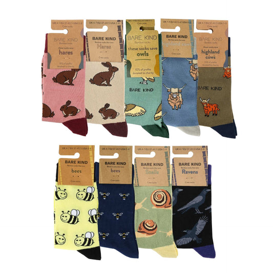 Collection of Bare Kind socks with animal-themed packaging on a white background