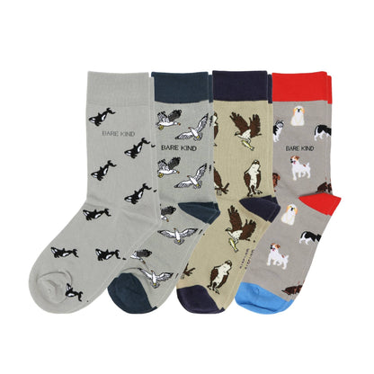 Four pairs of socks with animal patterns on a white background