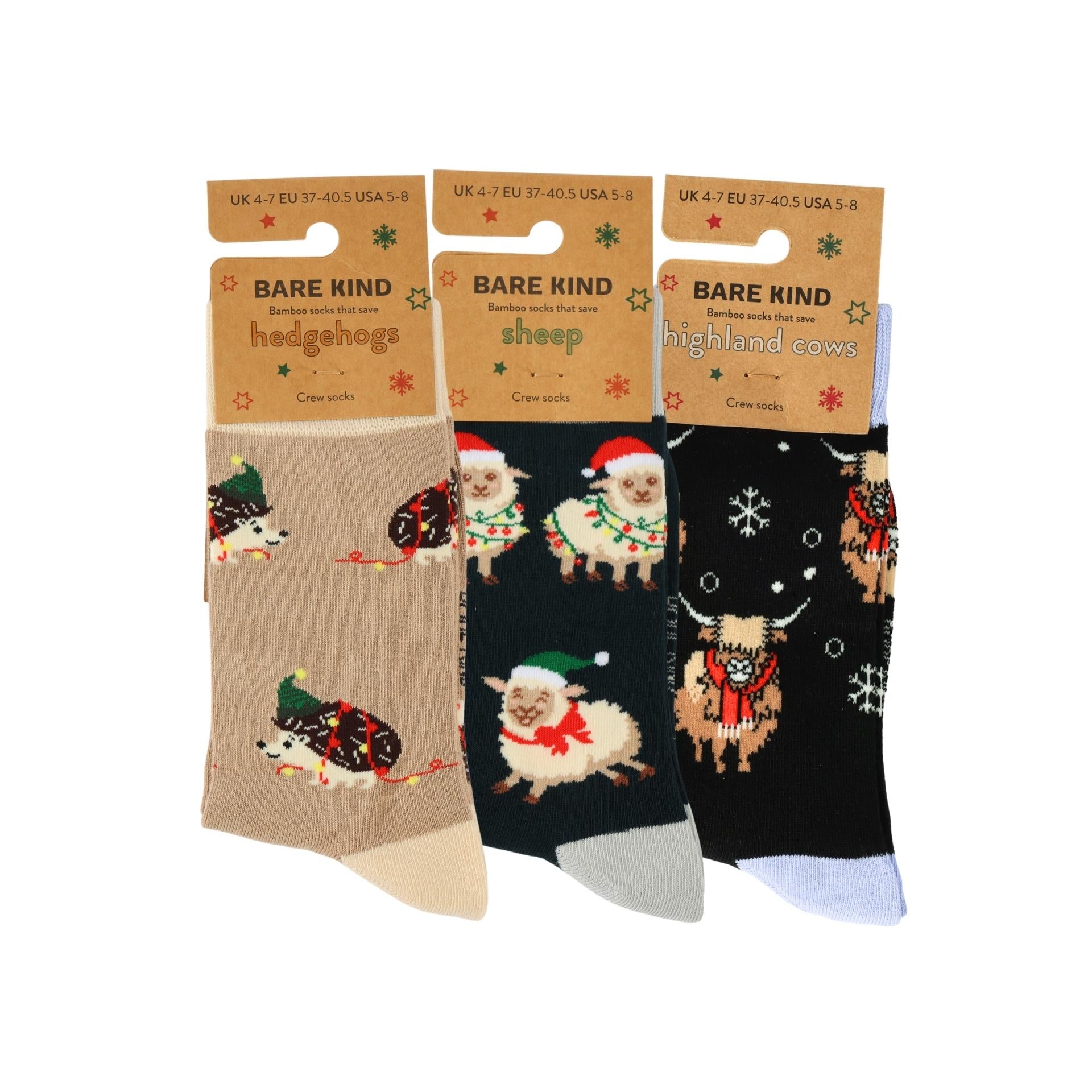 Three pairs of socks with animal designs on packaging labeled 'Bare Kind'.