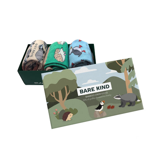 Set of bamboo crew socks with animal patterns in a box, featuring the brand 'Bare Kind'.