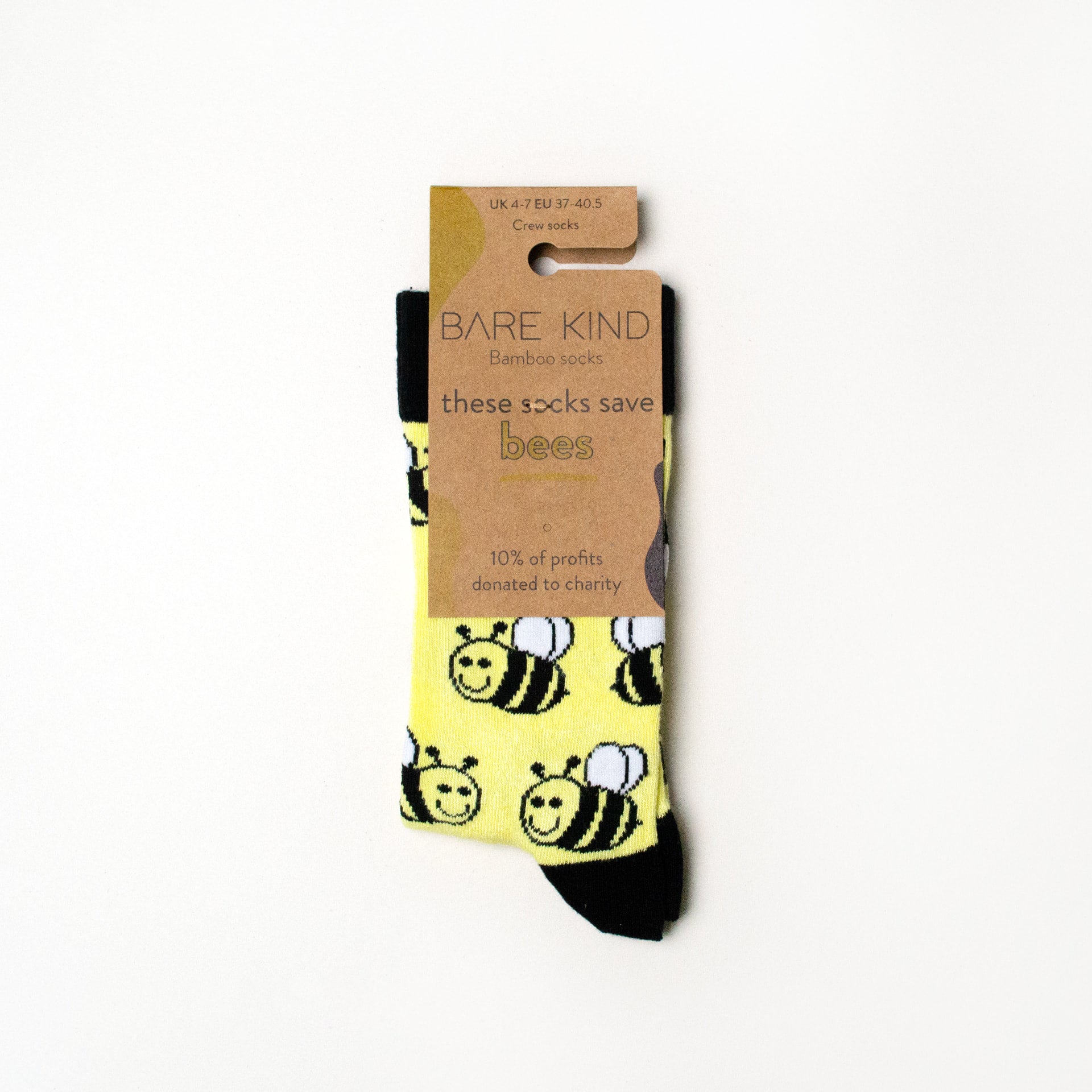 packaging flatlay of yellow bee bamboo socks