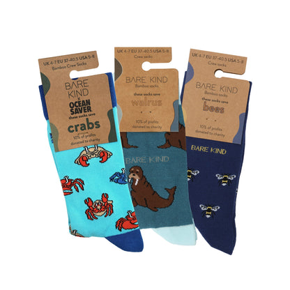 packaging flat lays of blue crab, walrus and bee motif bamboo socks