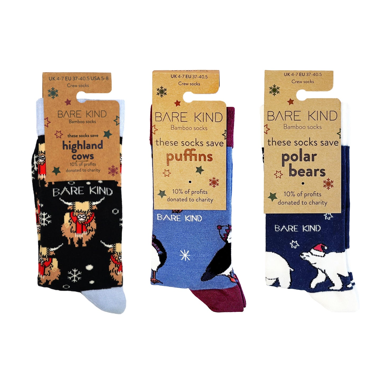 packaging flat lay image of christmas highland cow, puffin and polar bear bamboo socks in blue christmas bundle