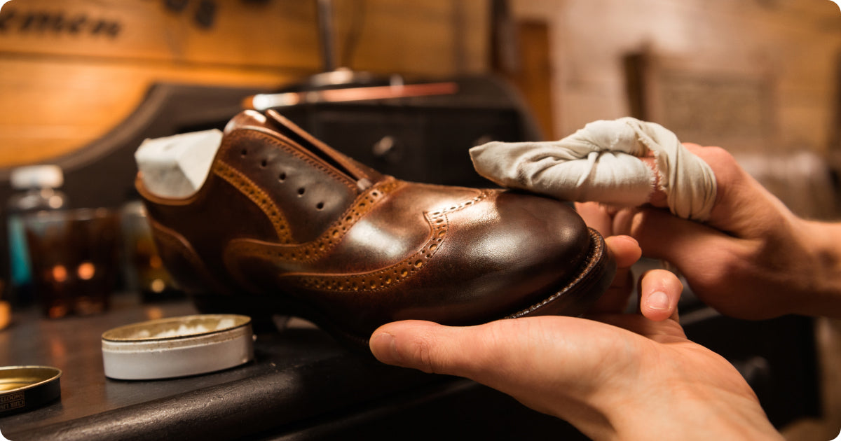 polishing the shoes with old socks