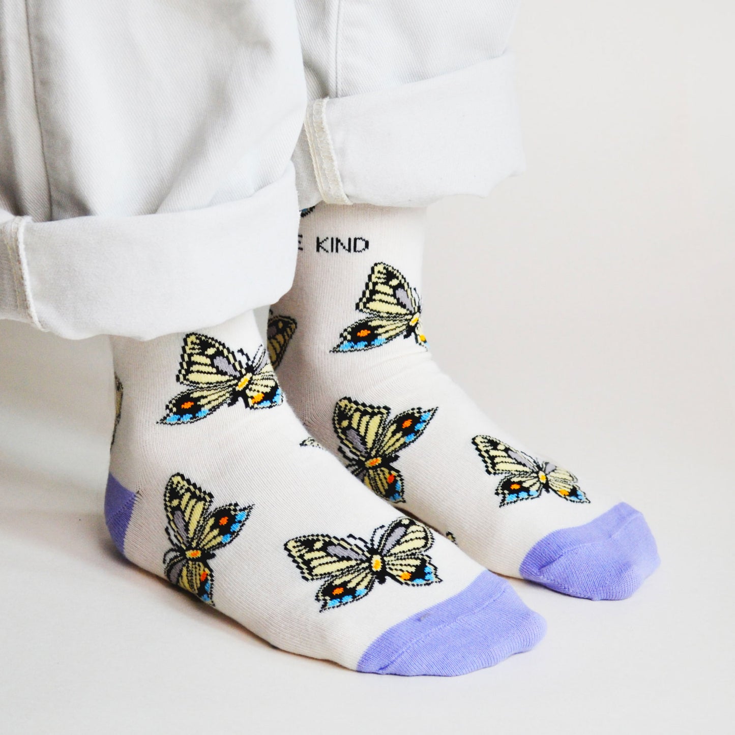 model wearing cream purple butterfly bamboo socks