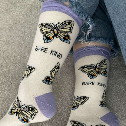 model wearing cream purple butterfly bamboo socks