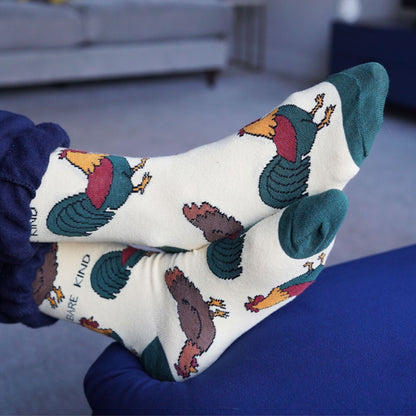model wearing yellow chicken bamboo socks