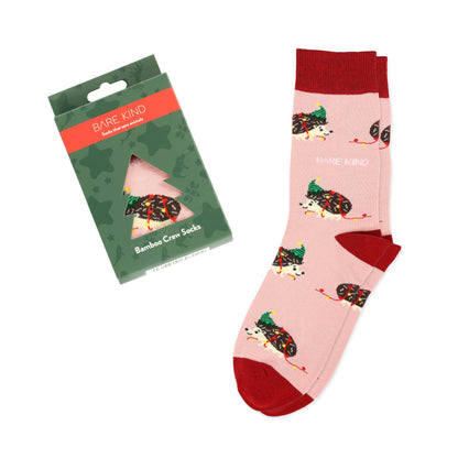 flat lay of bauble with christmas hedgehog bamboo socks