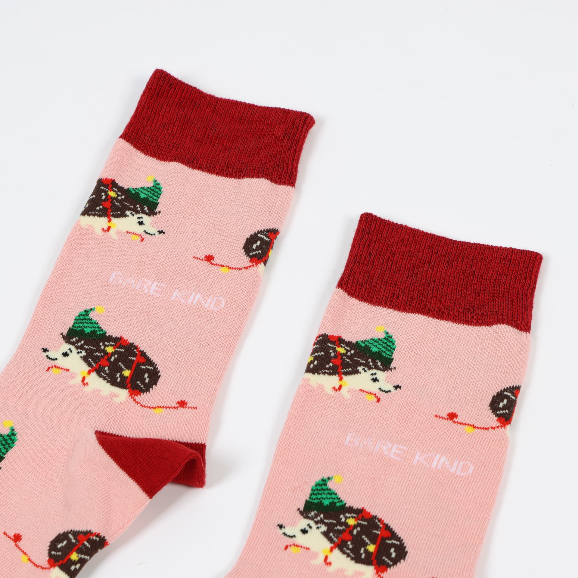 closeup to pink christmas hedgehog bamboo socks