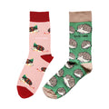 flat lays of green hedgehog and pink christmas hedghog bamboo socks