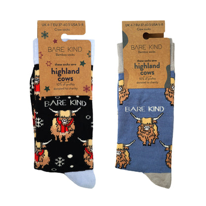 packaging flat lays of black Christmas highland cow and blue highland cow bamboo socks