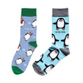 flat lays of penguin and christmas penguin bamboo socks