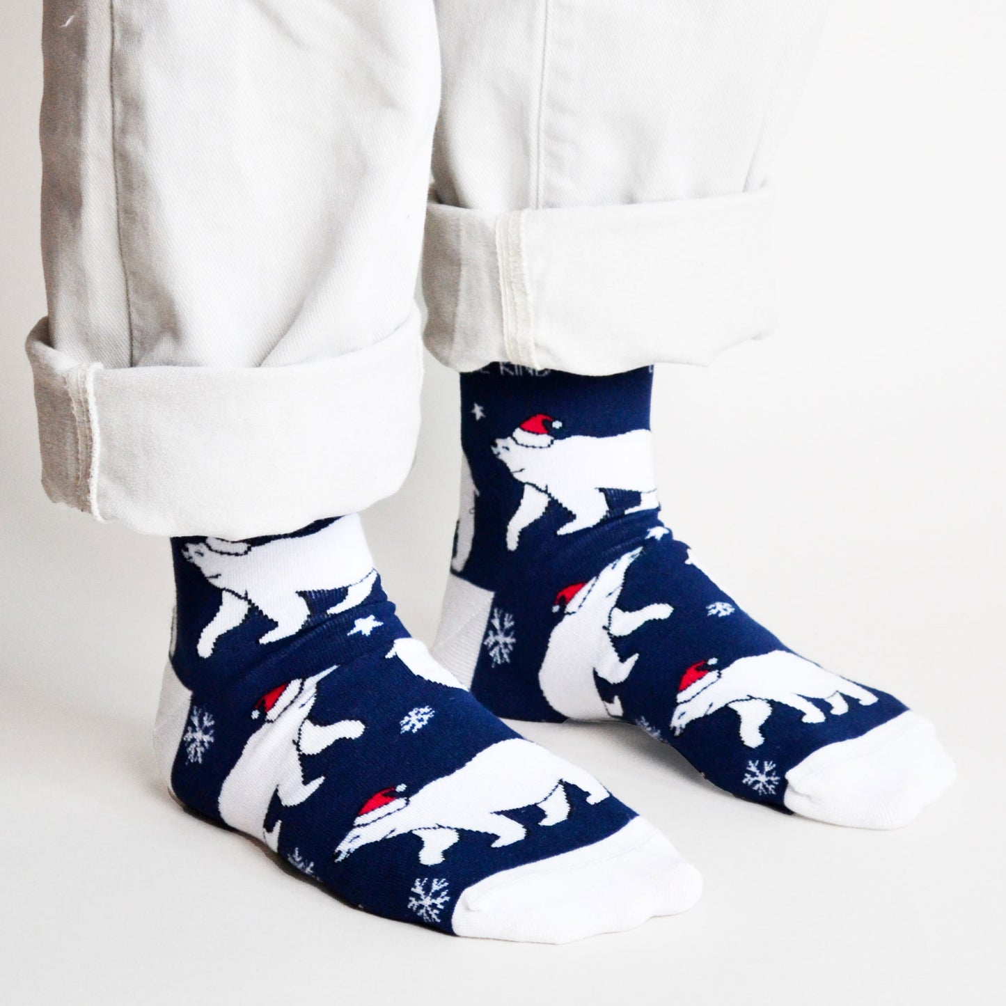 model wearing blue christmas polar bear bamboo socks