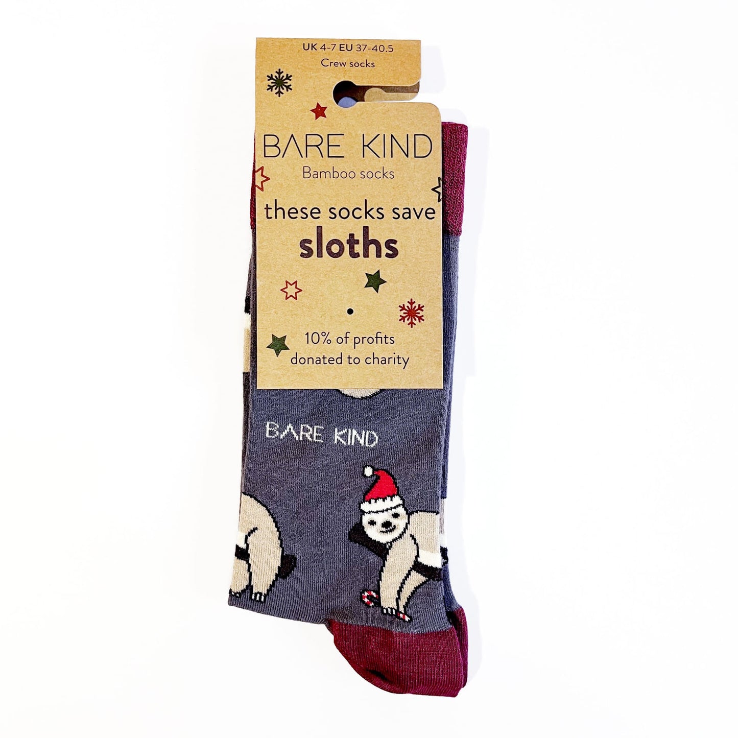 packaging flat lay of grey red christmas sloth bamboo socks