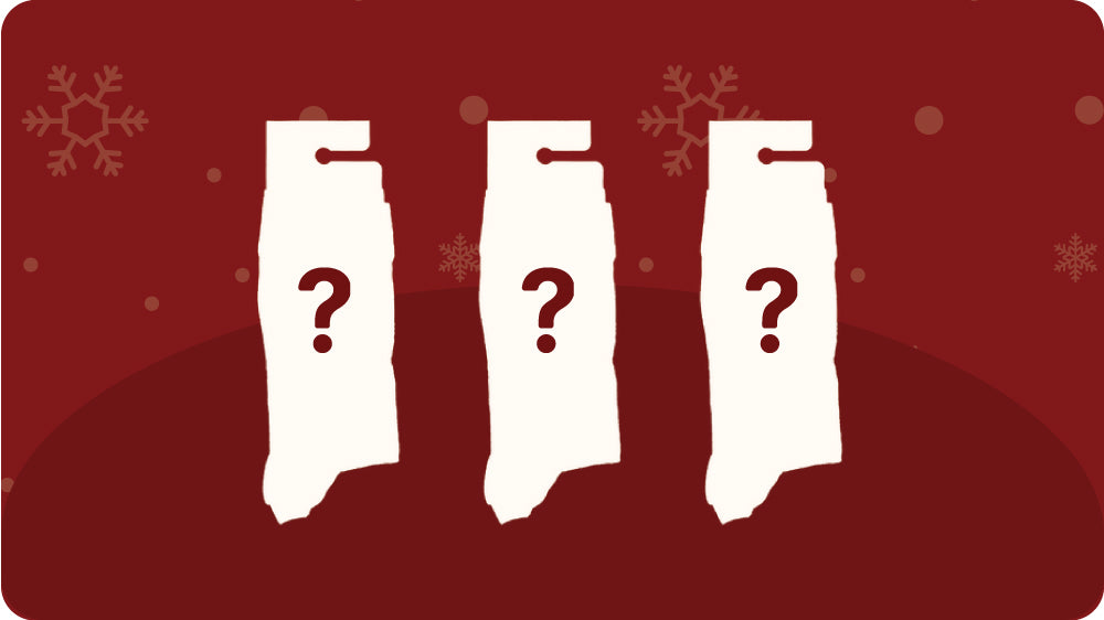 Three white packages with question marks on a red background with snowflake decorations