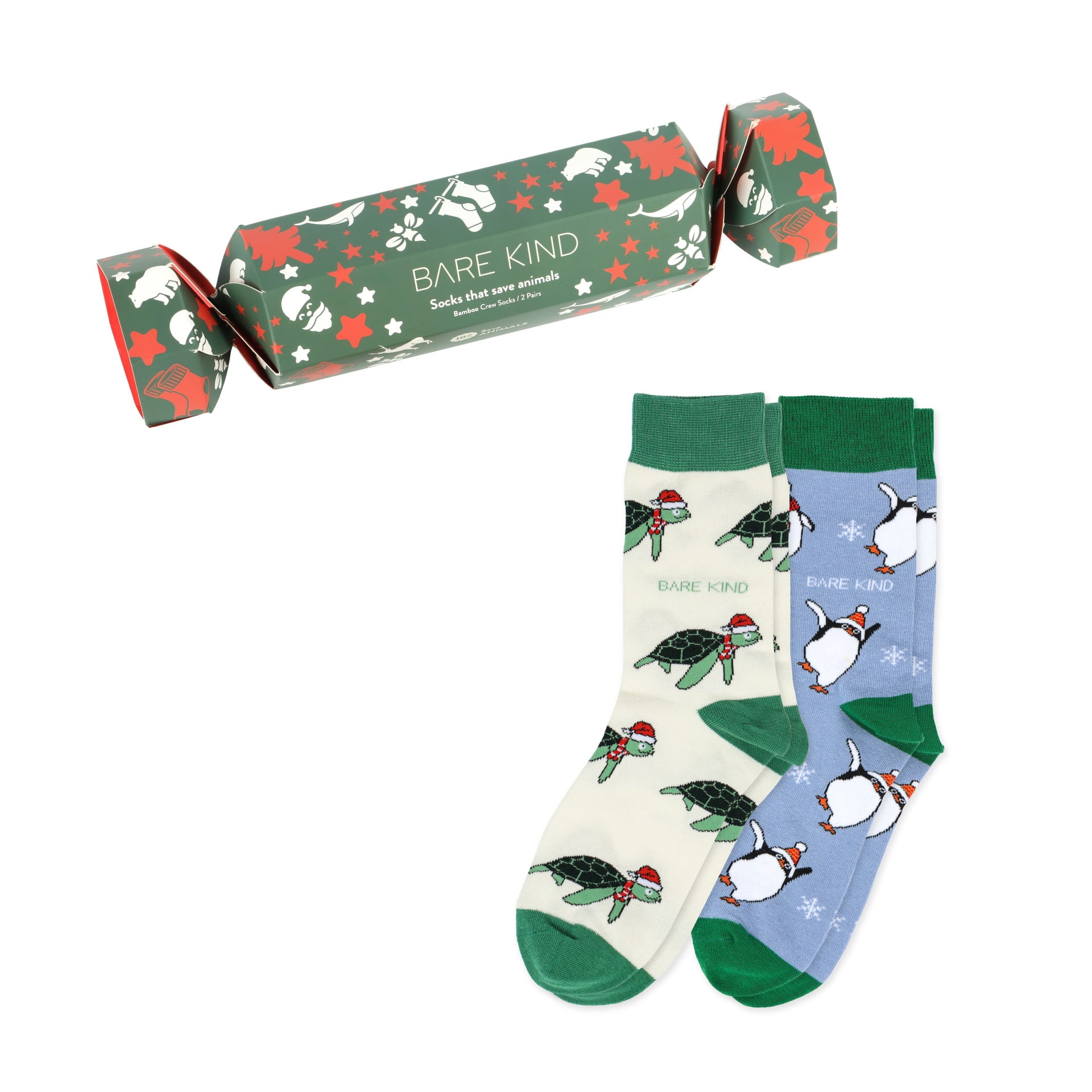 flat lay of cracker, christmas turtle and penguin bamboo socks