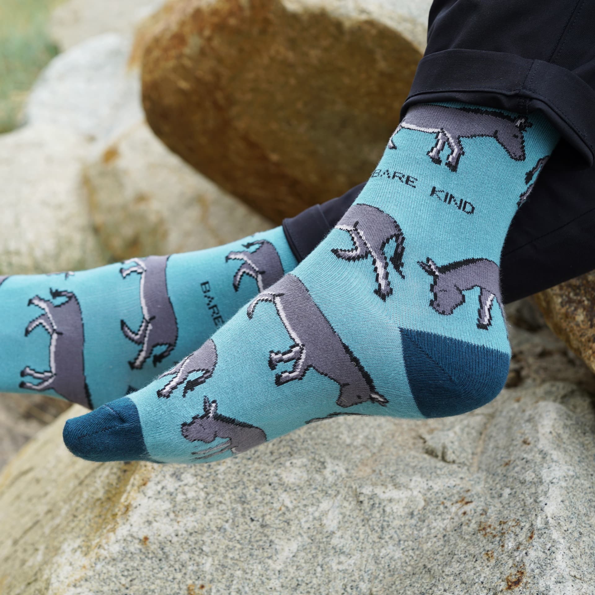 model wearing blue donkey bamboo socks