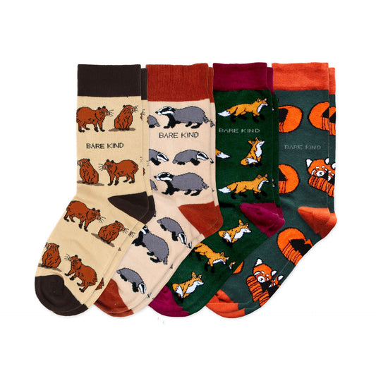 flat lays of capybara, badger, fox and red panda bamboo socks