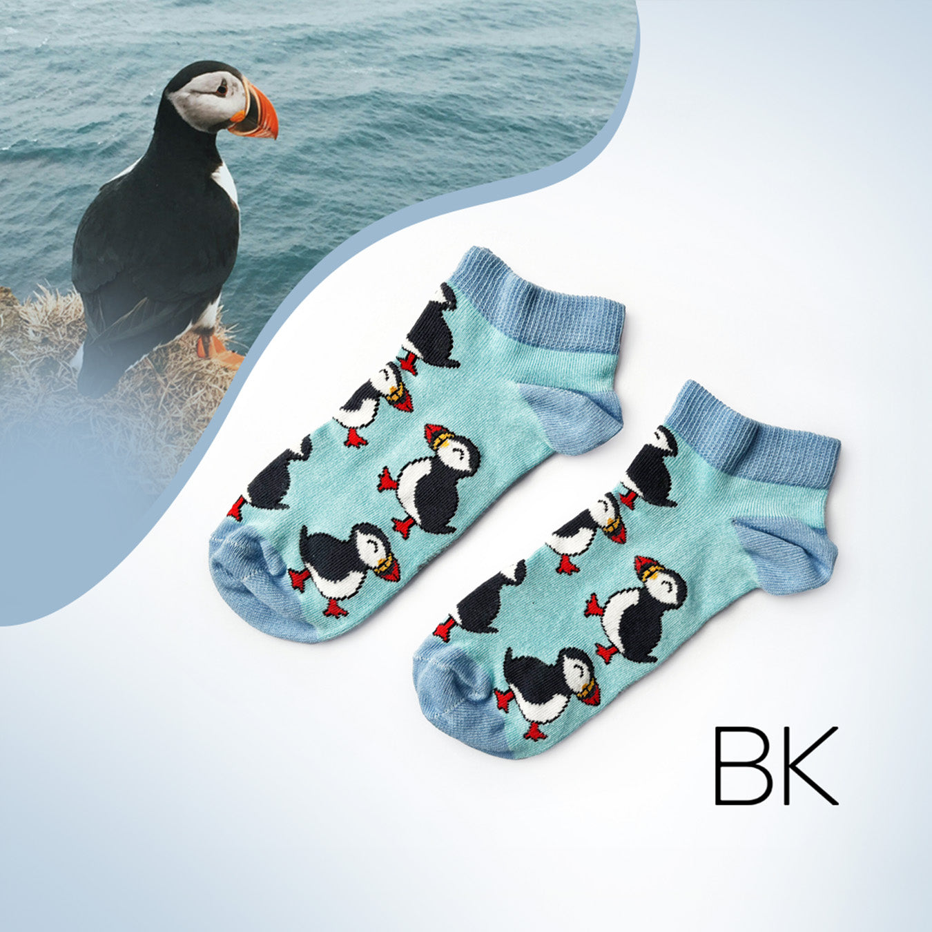 baby blue puffin trainer socks with puffin imagery