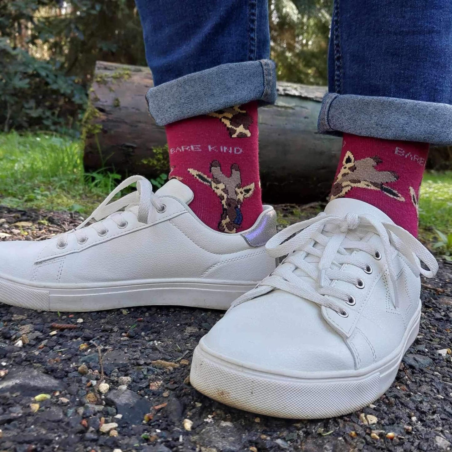 model wearing red giraffe bamboo socks