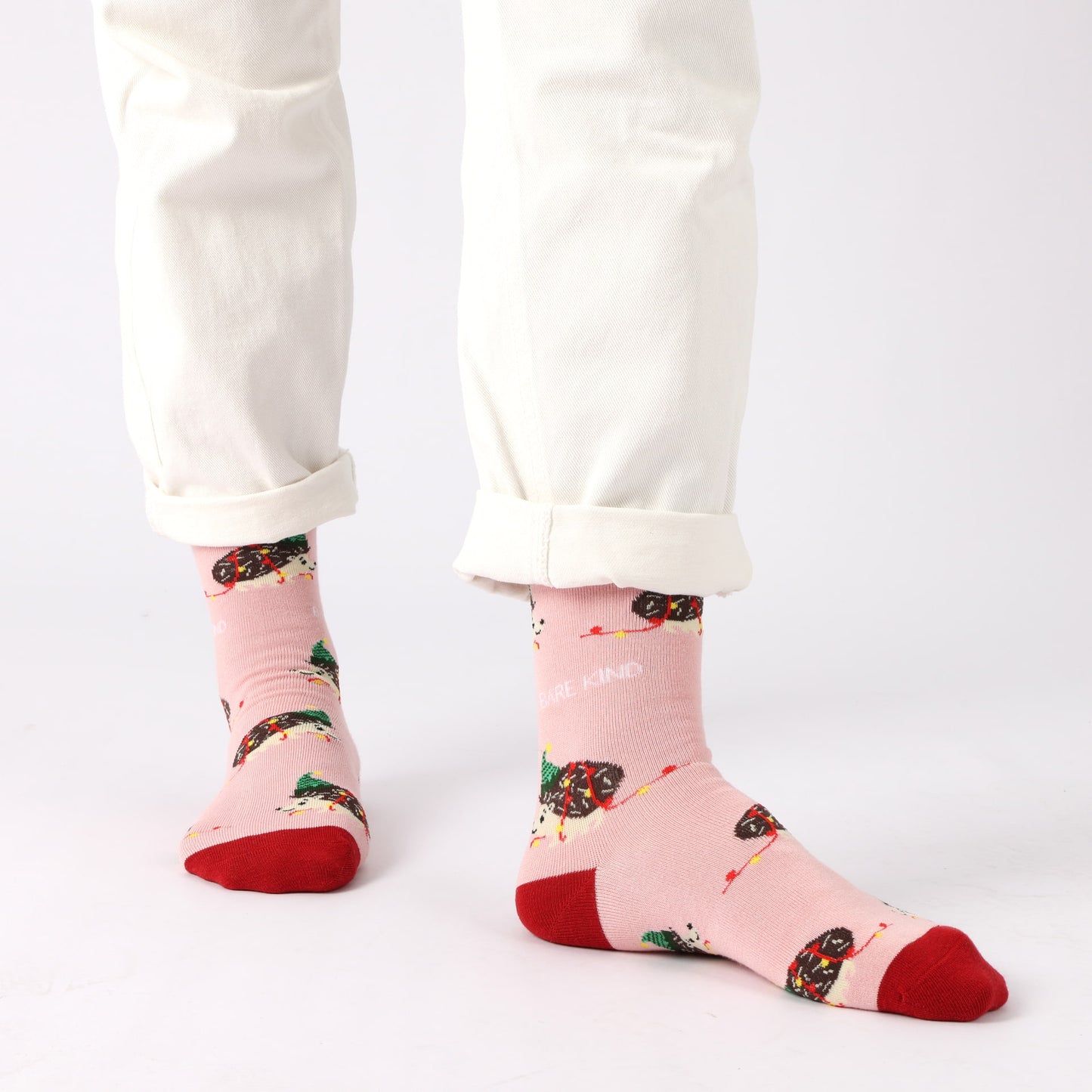 model wearing pink hedgehog bamboo socks