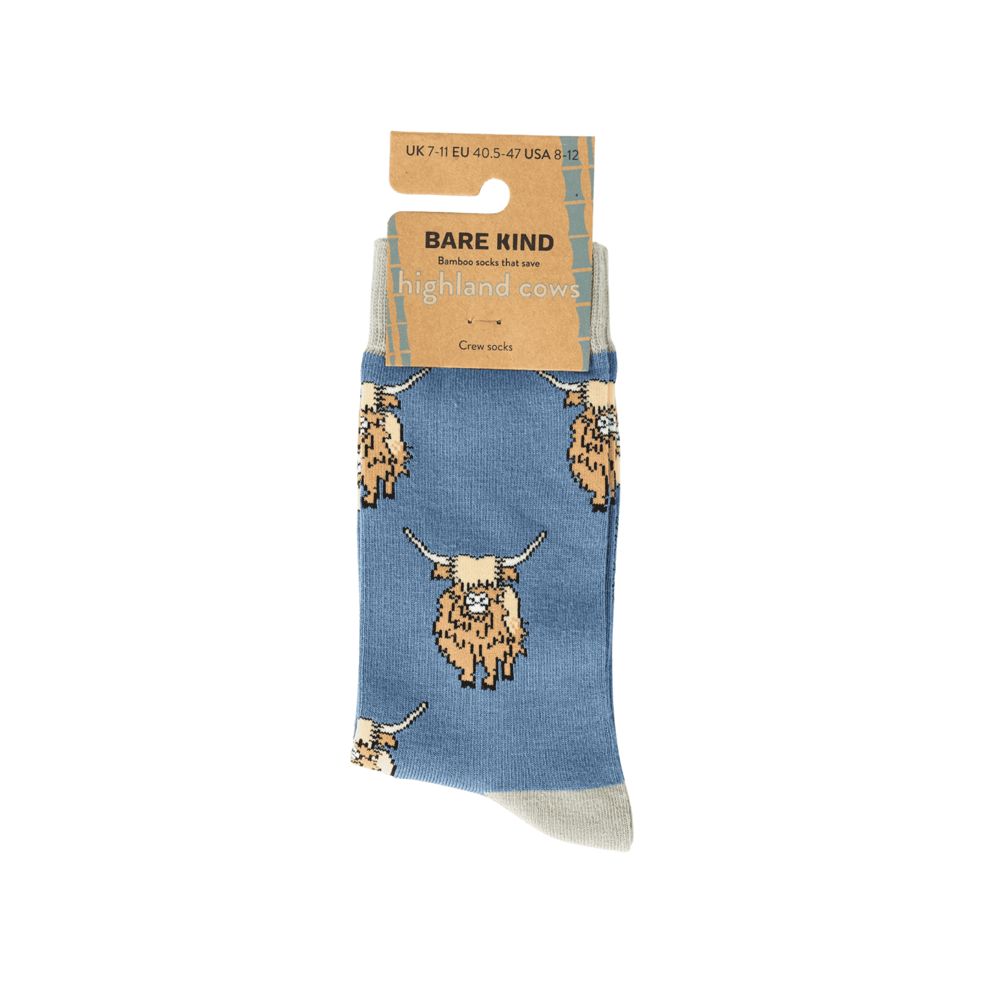 Blue sock with highland cow pattern on a white background, featuring Bare Kind packaging.