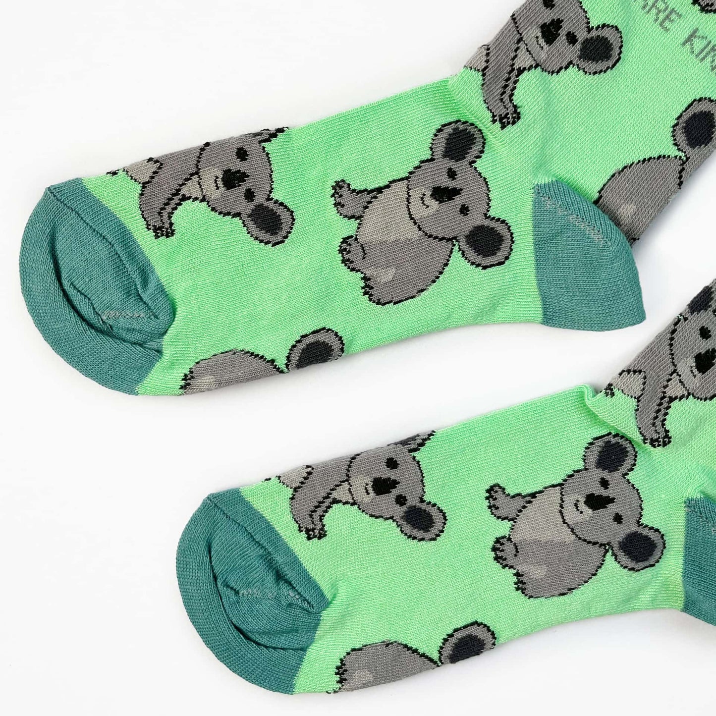 closeup flat lay of green koala bamboo socks