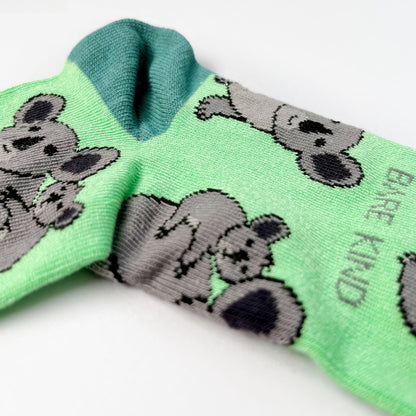 close up to green koala bamboo socks