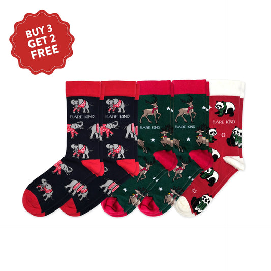 flat lays of 2 Christmas elephant, 2 Christmas reindeer and 1 Christmas panda bamboo socks