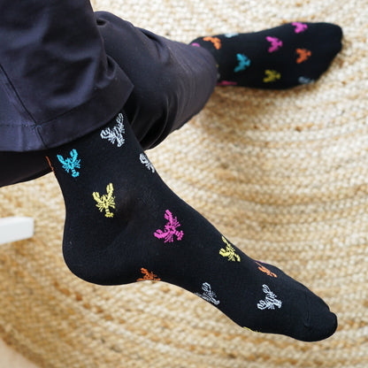 model wearing black lobster motif bamboo socks