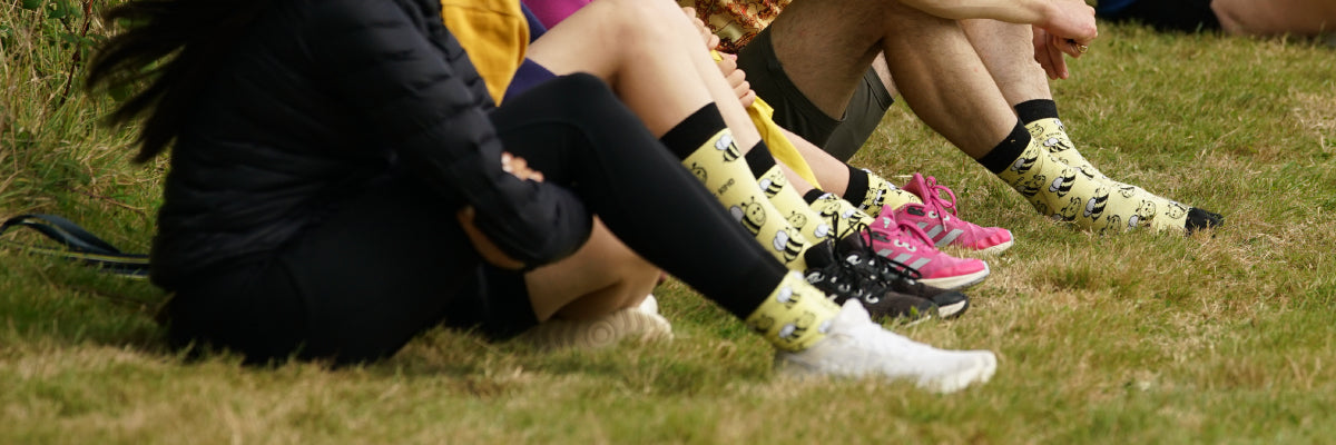 family wearing matching bee socks