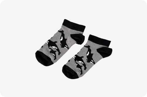 flat lay of grey black orca trainer bamboo socks