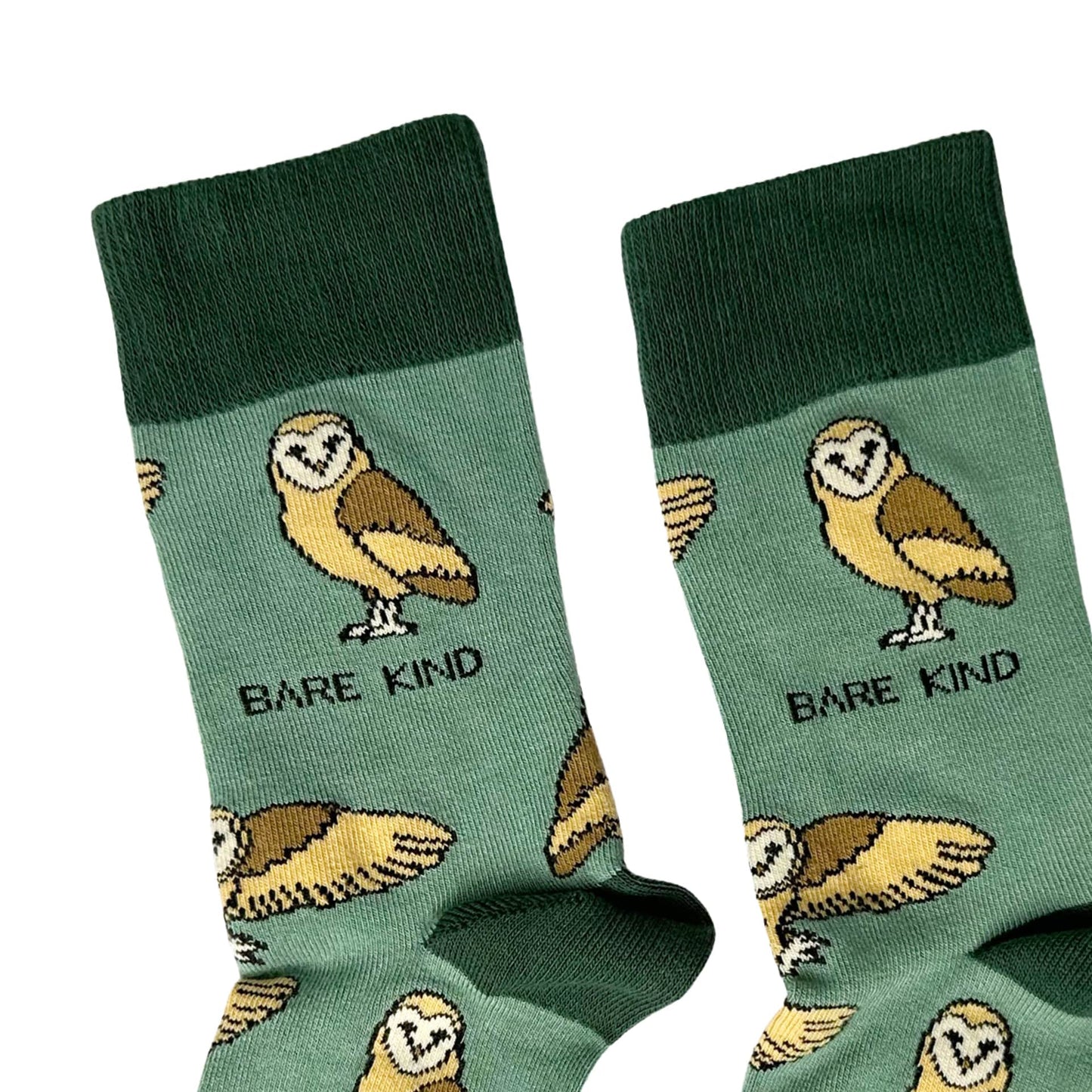 close up to green owl bamboo socks