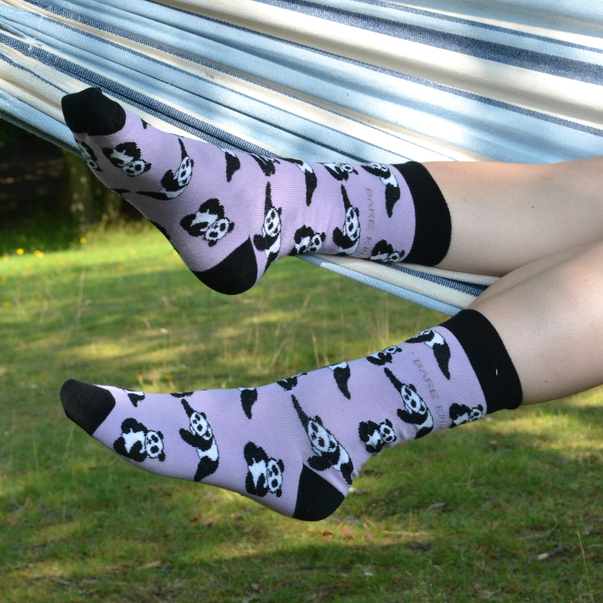 model wearing purple panda bamboo socks