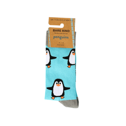Pair of penguin-themed socks with a 'Bare Kind' label on a white background