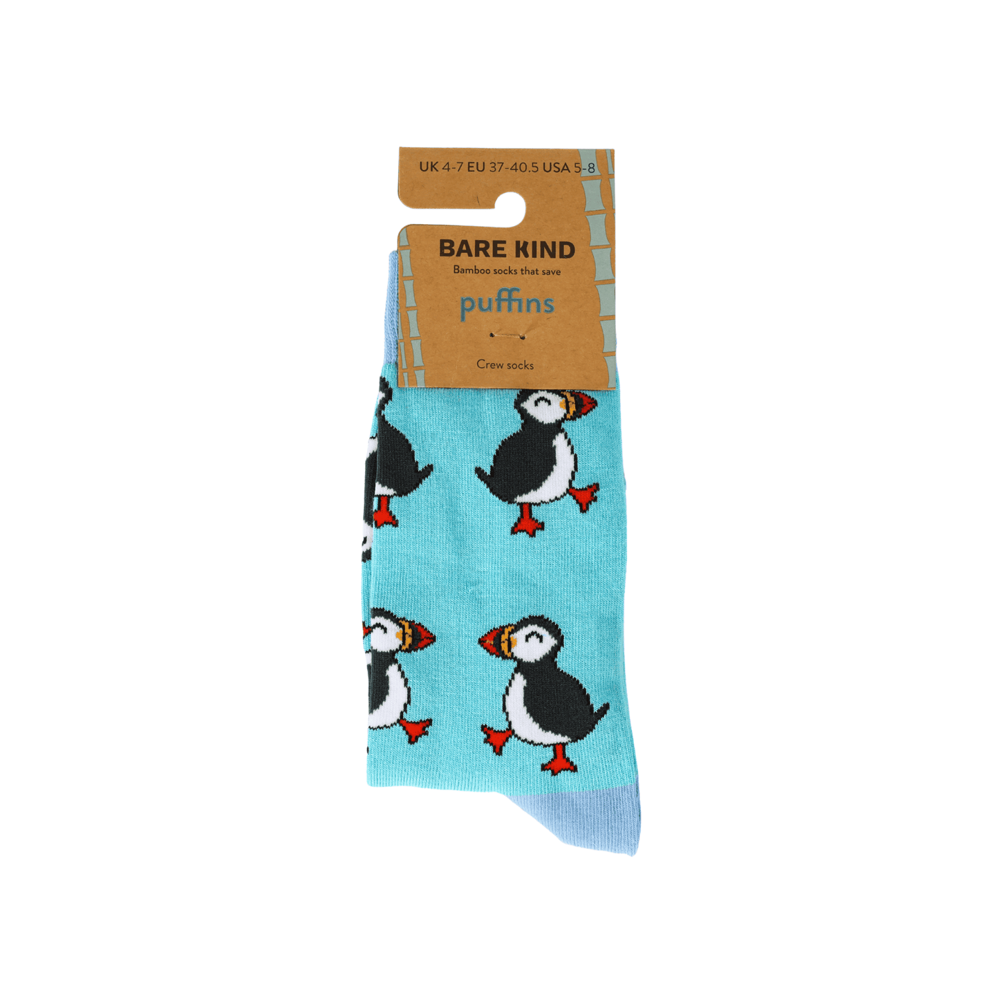 Pair of socks with penguin design and Bare Kind packaging on a white background