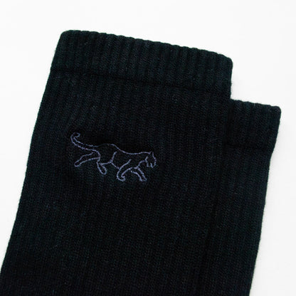 closeup to black ribbed panther bamboo socks