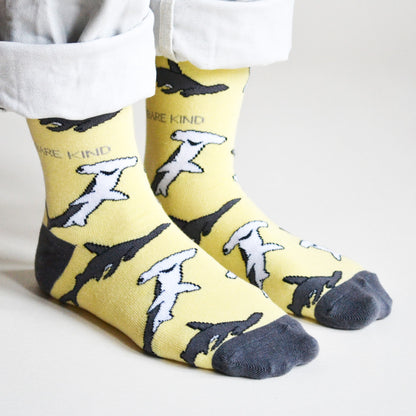 model wearing yellow shark bamboo socks