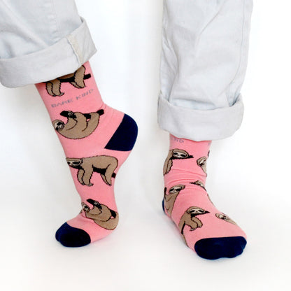 model wearing pink sloth bamboo socks