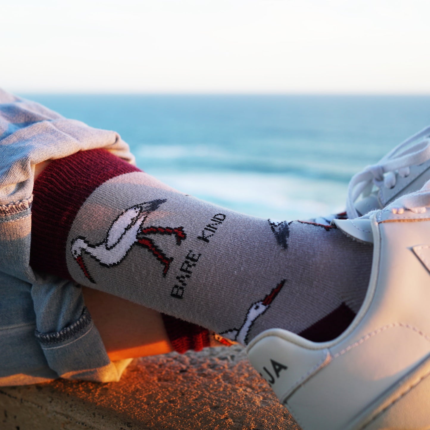 model wearing pink stork bamboo socks