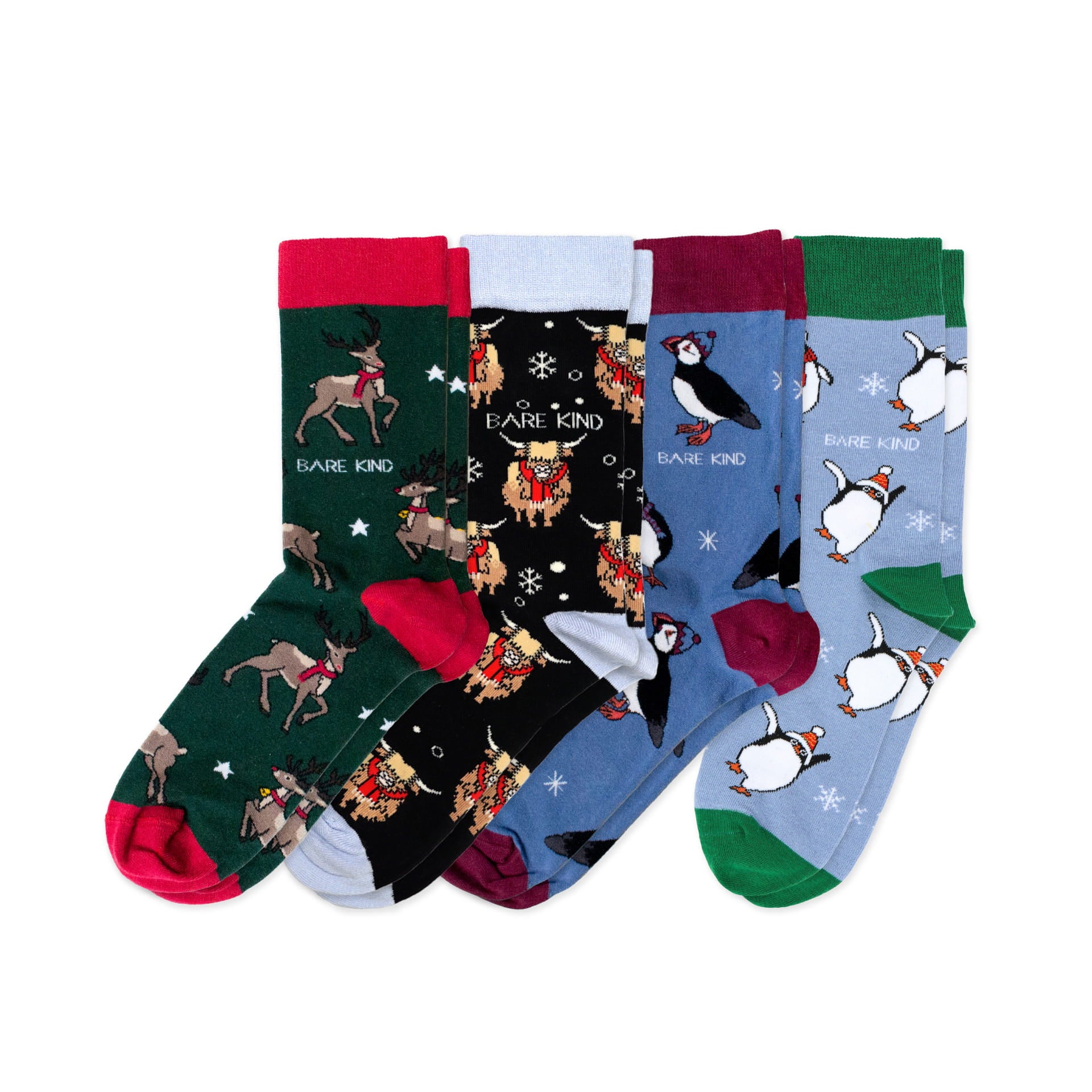 flat lay image of christmas reindeer, christmas highland cow, christmas hedgehog and christmas puffin bamboo socks bundle