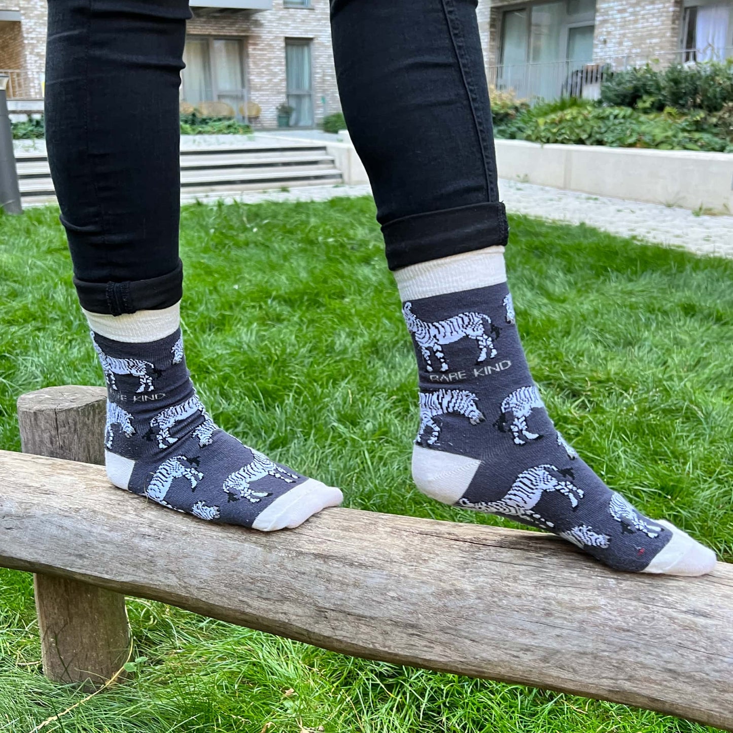 model wearing grey zebra bamboo socks